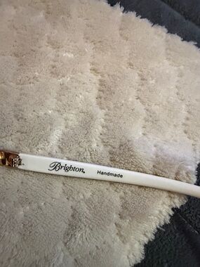 Brighton White Eyewear Temple with Script Logo and Gold Accent